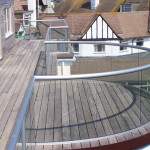 curved and straight glass balcony